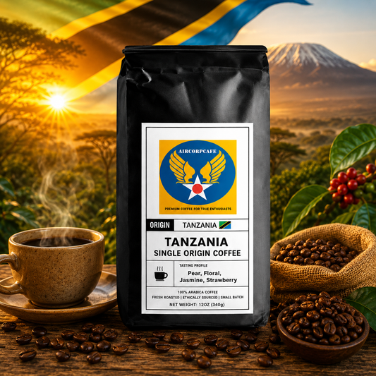Coffee bag with Tanzania label, steaming cup, coffee beans, and coffee plant in front of a sunset over Mount Kilimanjaro.