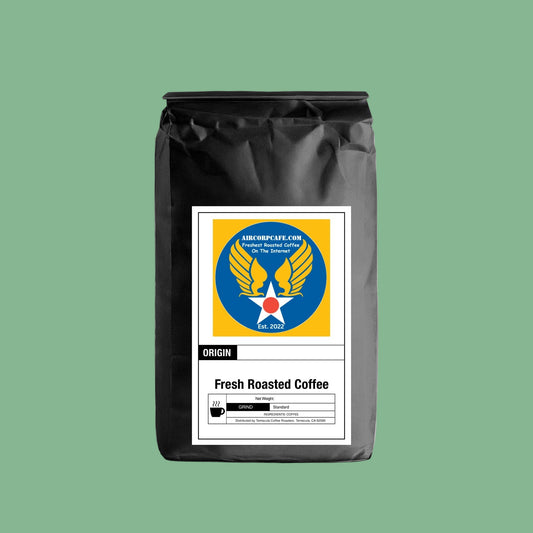 Black coffee bag with a label featuring the USAAF logo design on a grey background